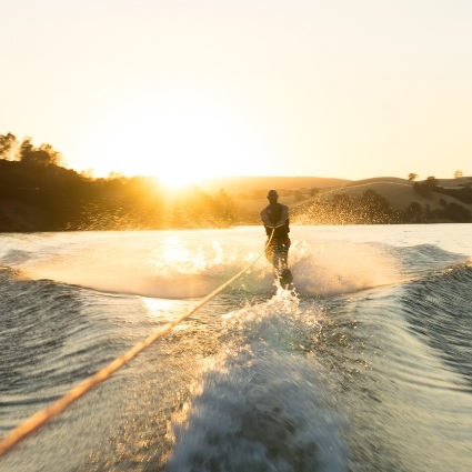 Person waterskiing on a lake