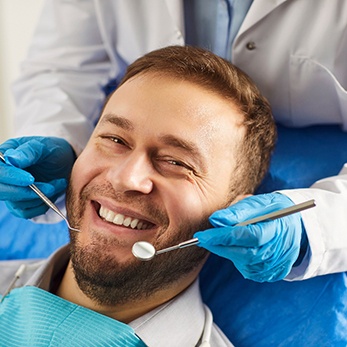 Man grinning in the dental chair